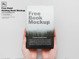 Free Hand Holding Book Mockup PSD Template