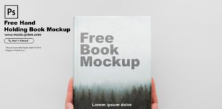 Free Hand Holding Book Mockup PSD Template