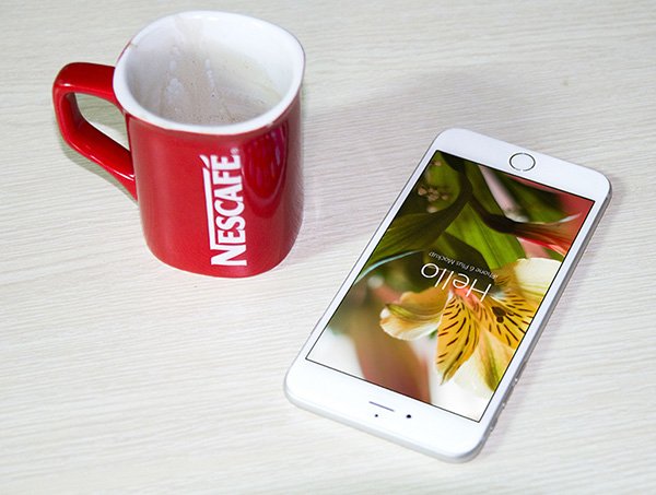 Nescafe Coffee Cup Mockups with iPhone Free PSD