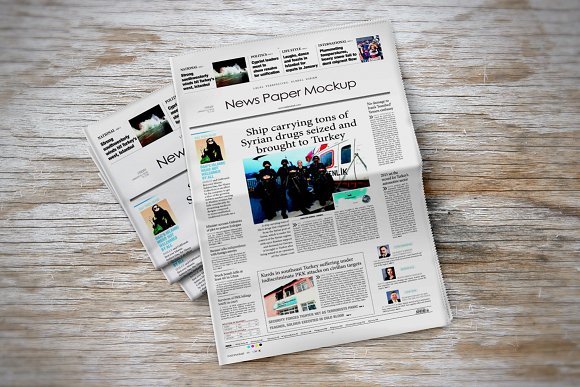 Newspaper on a Wooden table PSD Mockup