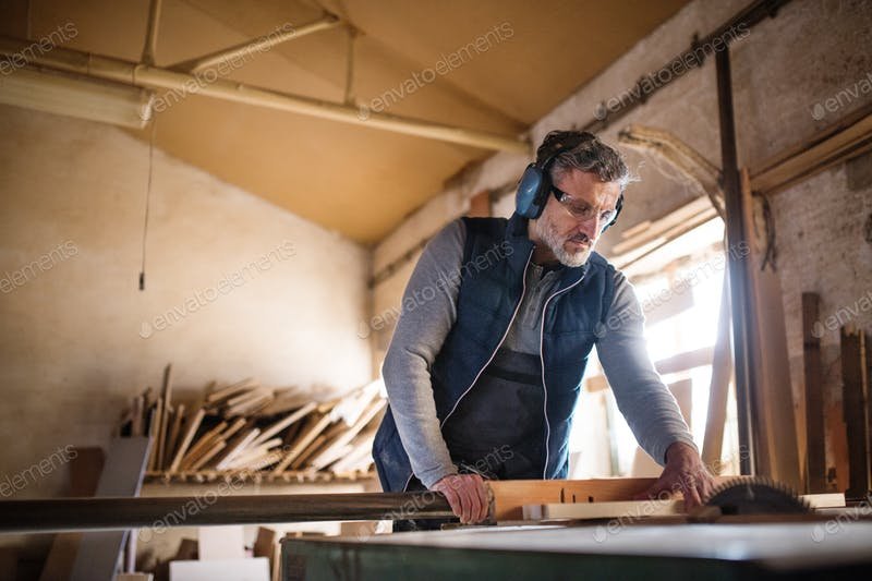 Picture Of A Carpenter Working On A Wood