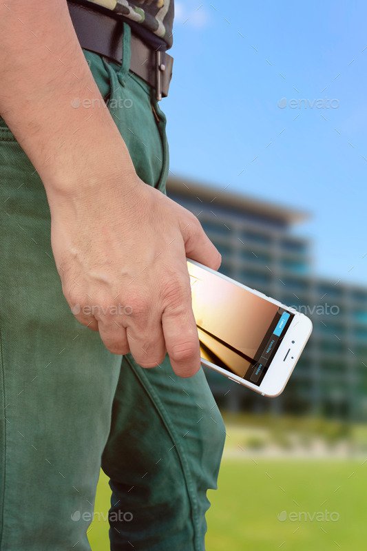 Smartphone in Hand Mockup