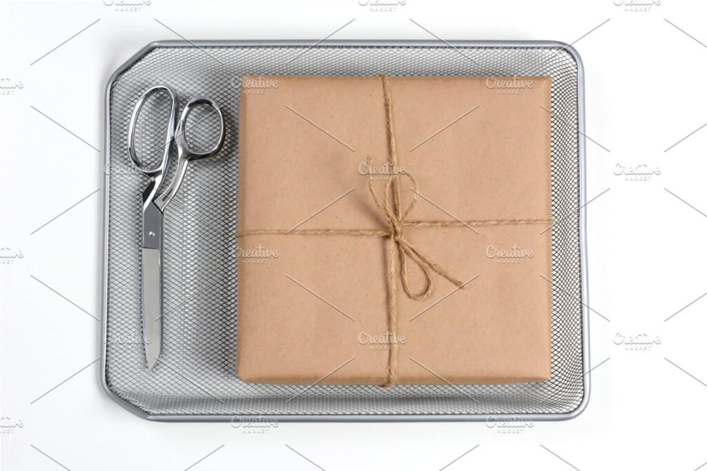 Steel Tray With Scissor And Package On It PSD File