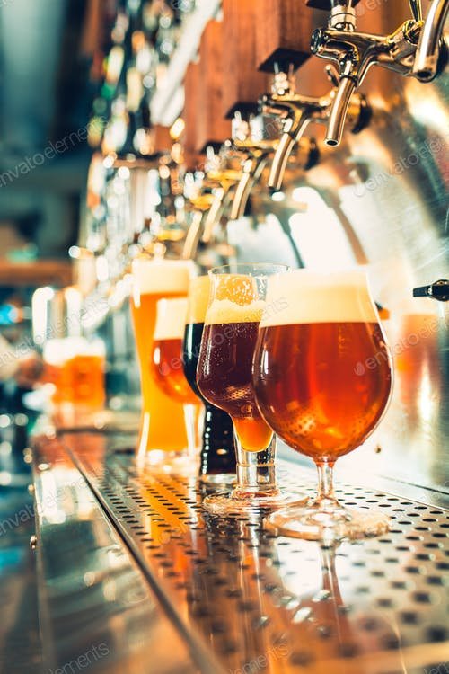 Taps Filling Beer At A Pub PSD Template. 