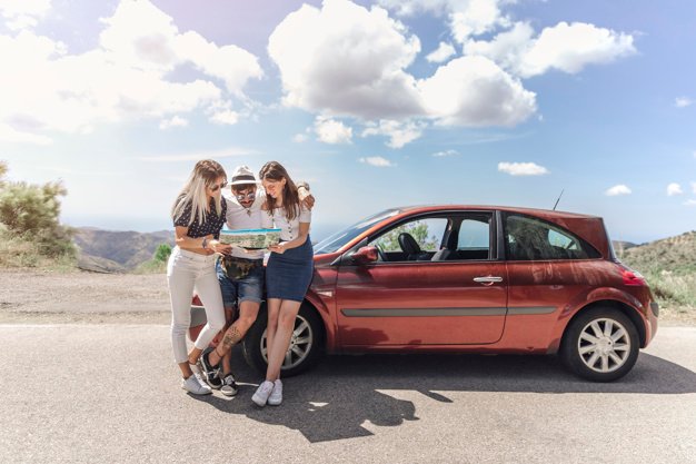 Three Friends Looking At The Map Near a Modern car mockup.