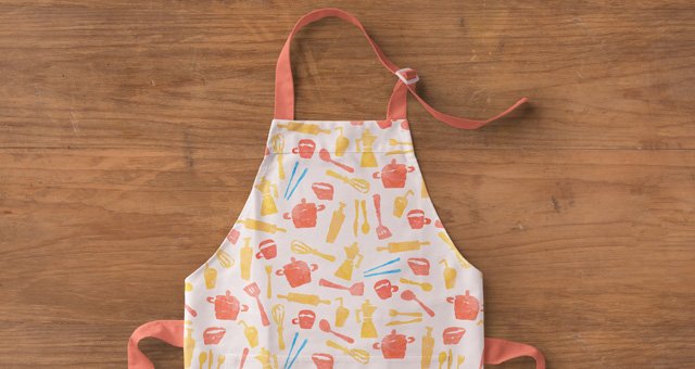 Apron on Wooden Table Mockup PSD: