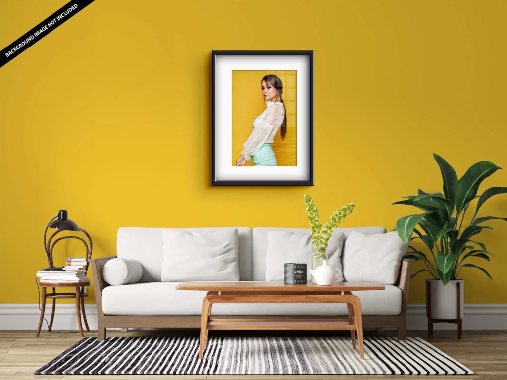 Free Photo Frame Mockup in A Living Room PSD Template