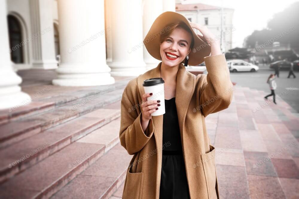 Girl in a brown coat a brown hat