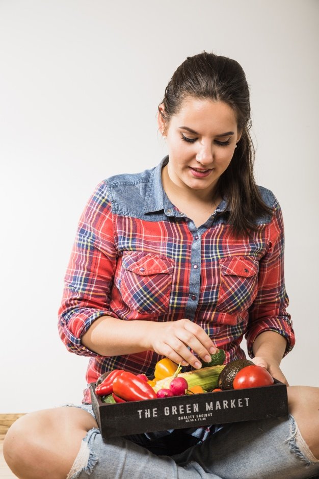 Woman picking vegetables wearing Polo Shirt PSD Mockup: