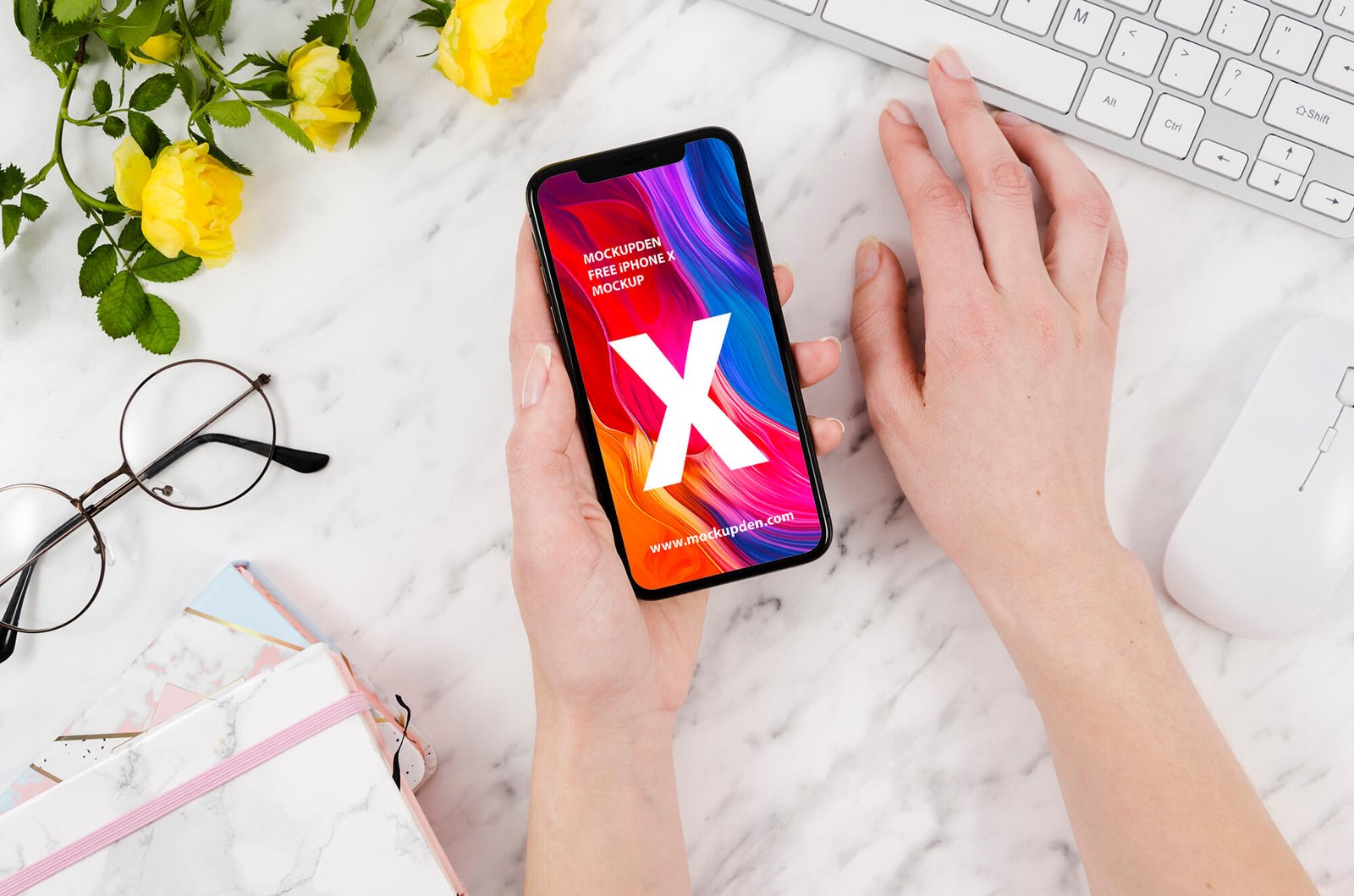 Free iPhone X Mockup in Hand PSD Template Mockup Den