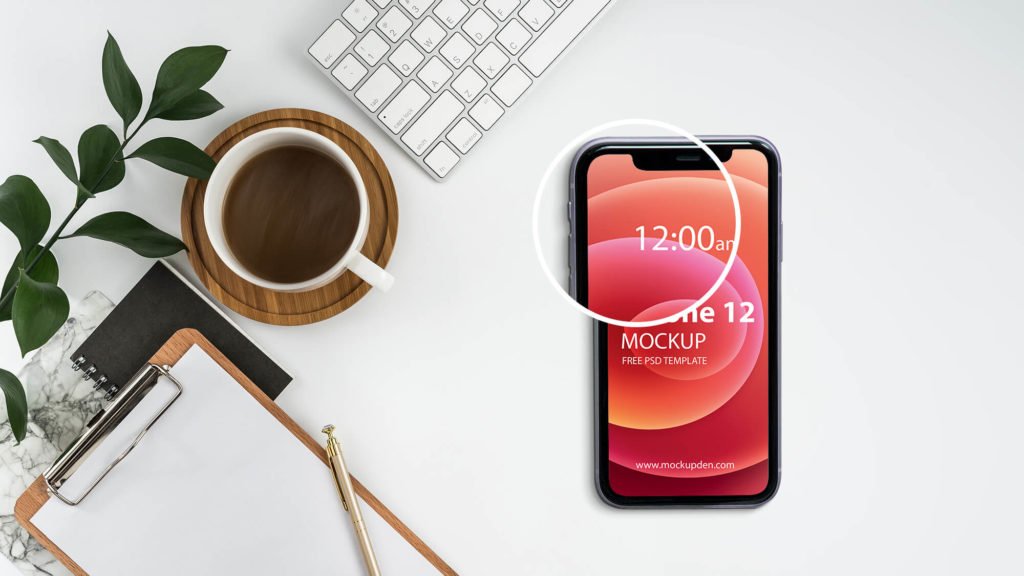 Close Up Of a Free iPhone 12 On Desk Mockup PSD Template