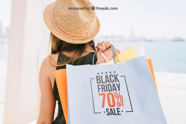 Mock up design with woman holding shooping bags Free Psd