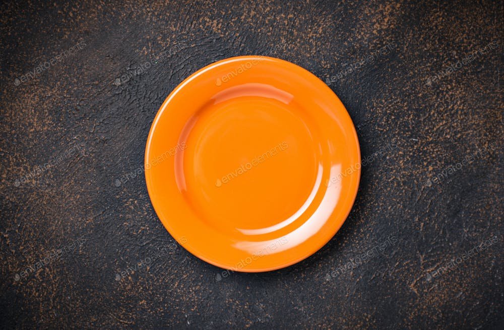 Empty plate on concrete table (1)