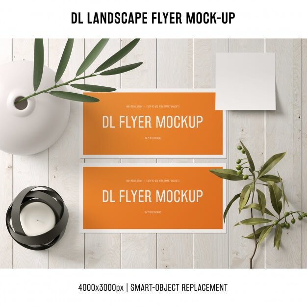 Dl landscape flyer mockup with plants Free Psd