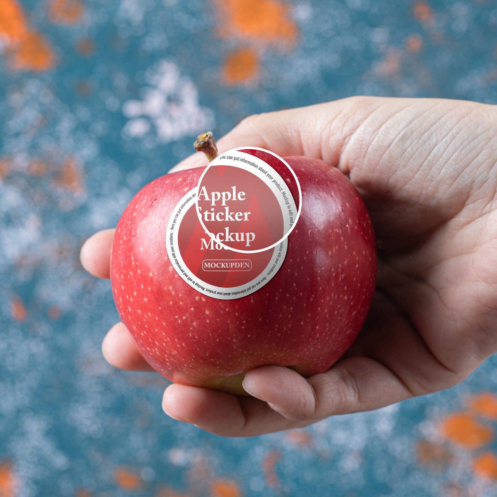 Close Up Of a Free Apple Sticker Mockup PSD Template