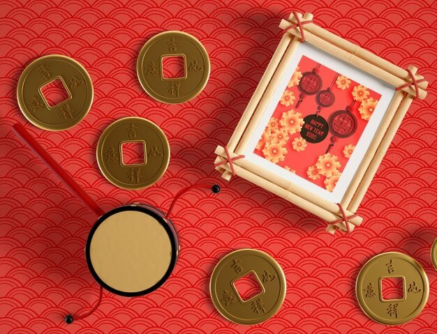 Frame mock up and chinese golden coins Free Psd