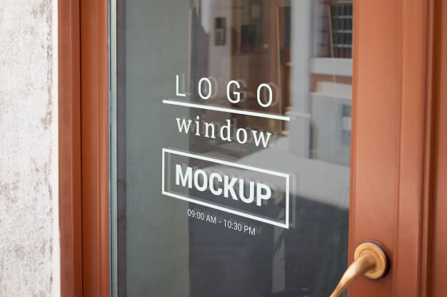 Logo mockup on store front door window Premium Psd