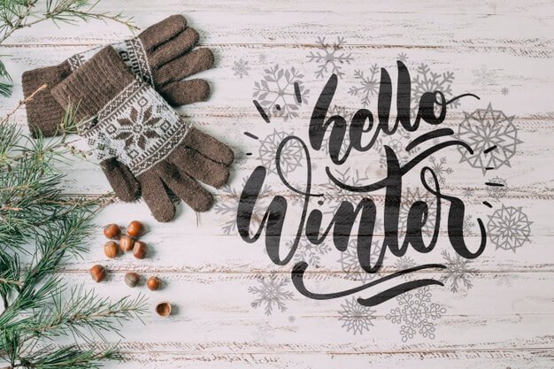 Top view hello winter with warm gloves Free Psd