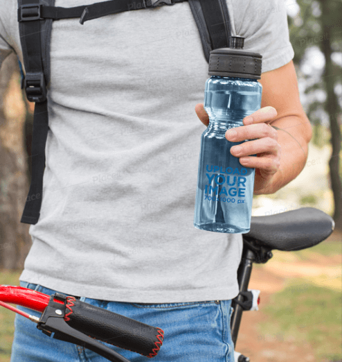 Sports Bottle Mockup Featuring a Man on a Mountain Bike