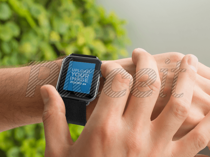 Young Man Using his Black Apple Watch Outdoors