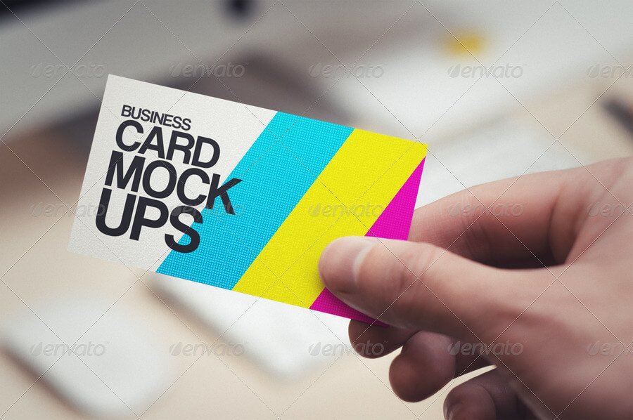 Business Card in Hand Mock-Ups