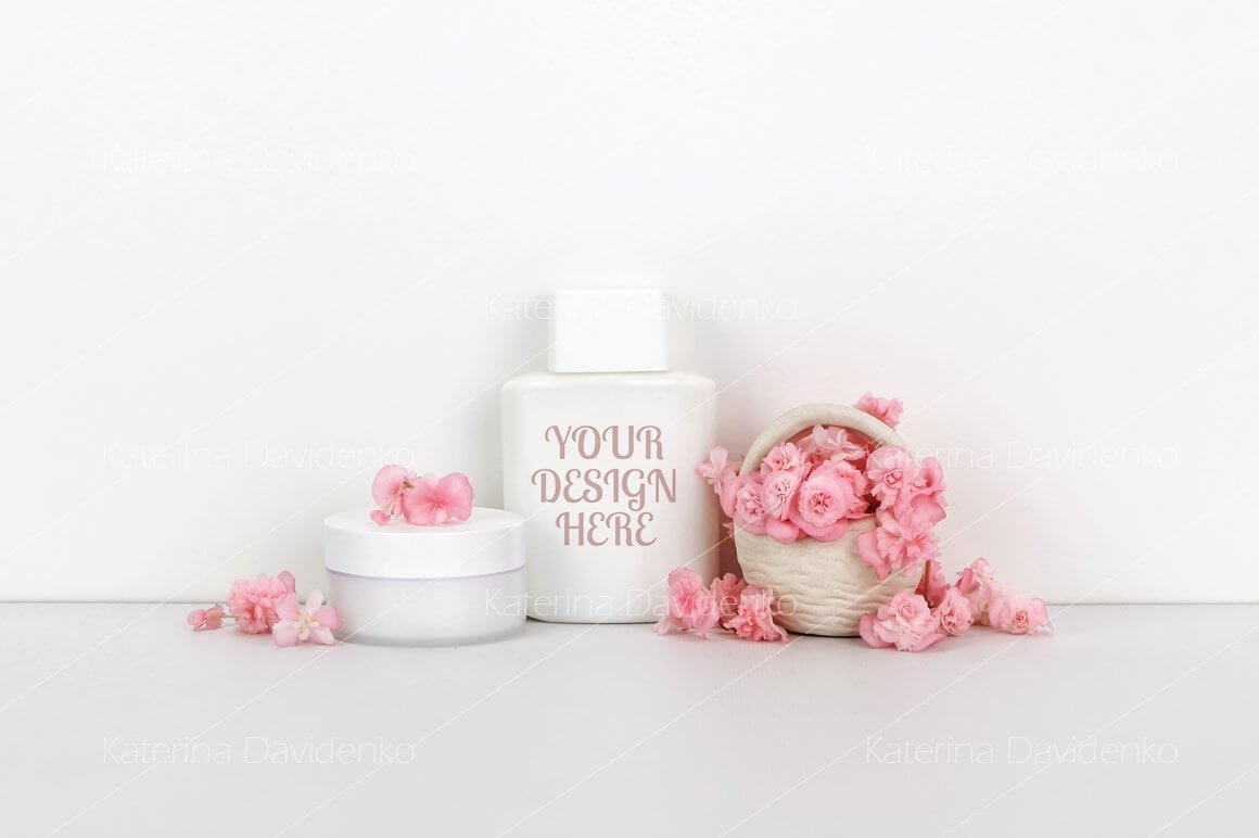 Cosmetics mockup with pink flowers