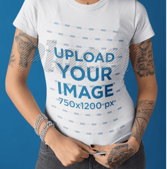 Tattooed Woman Mockup Standing While Wearing a Round Neck Tee Against a Solid Color Background