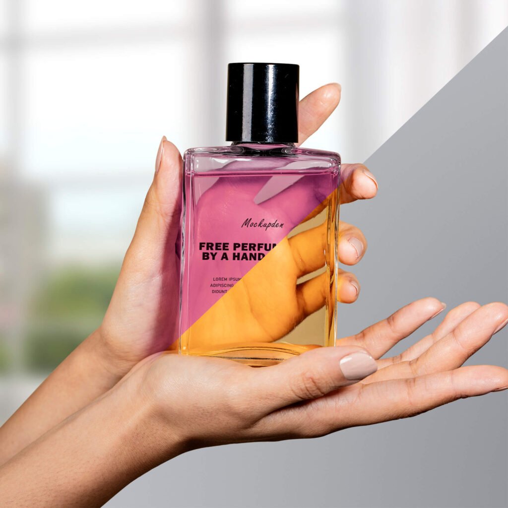 Editable Free Perfume Held by a Hand Mockup PSD Template